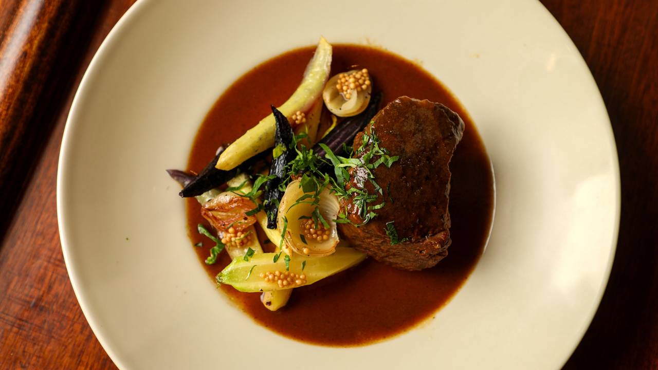 Le Moyne Bistro signature dishes Chicken au RieslingGulf Tuna NiçoiseBeef Short Rib CarbonnadeBone Marrow & Escargot